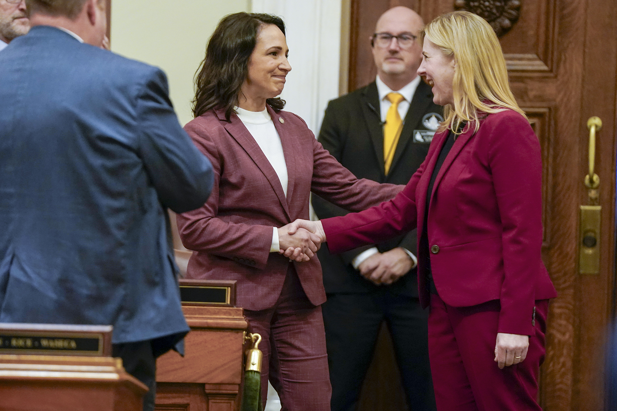 House Speaker Emerita and DFL Leader Melissa Hortman, right, congratulates current House Speaker Lisa Demuth following her election to the position Feb. 6. Following a DFL special election victory Tuesday, the House is deadlocked in a 67-67 tie. (Photo by Michele Jokinen)